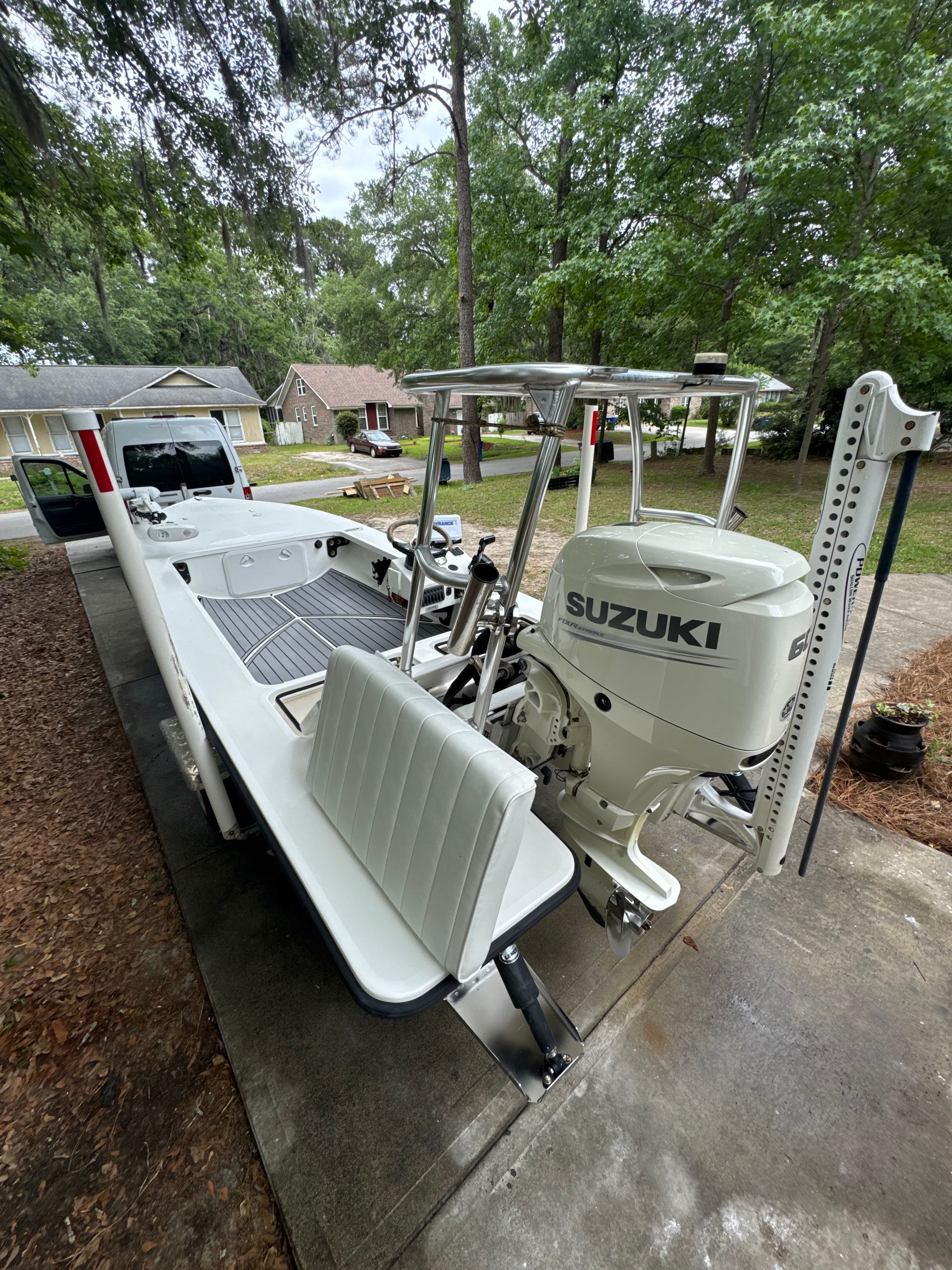Center console boat with Suzuki outboard, mobile detailing in Charleston, SC by Moonshine Detailing