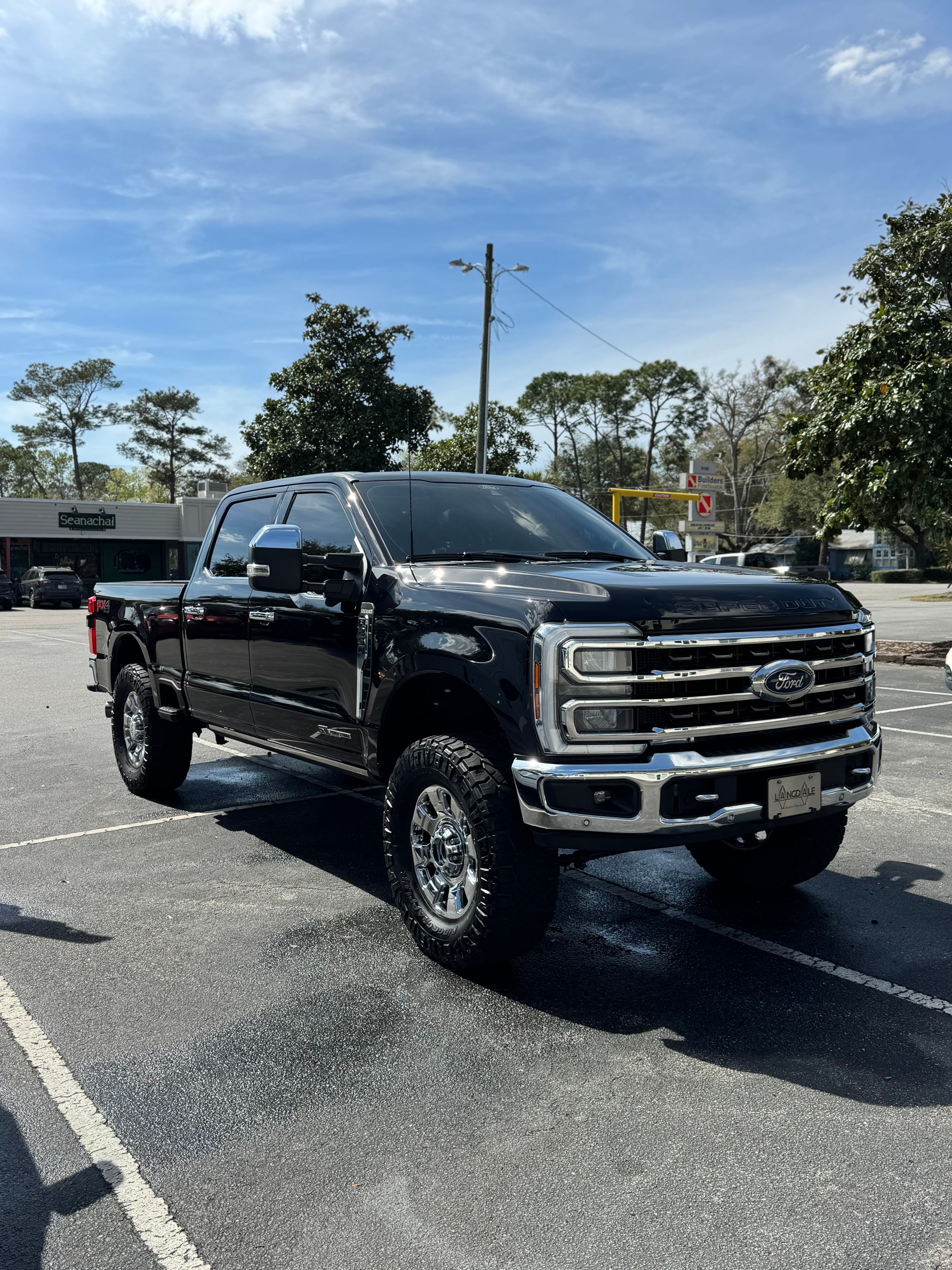 Black Ford F-250 Lariat lifted truck, mobile detailing in Charleston, SC by Moonshine Detailing